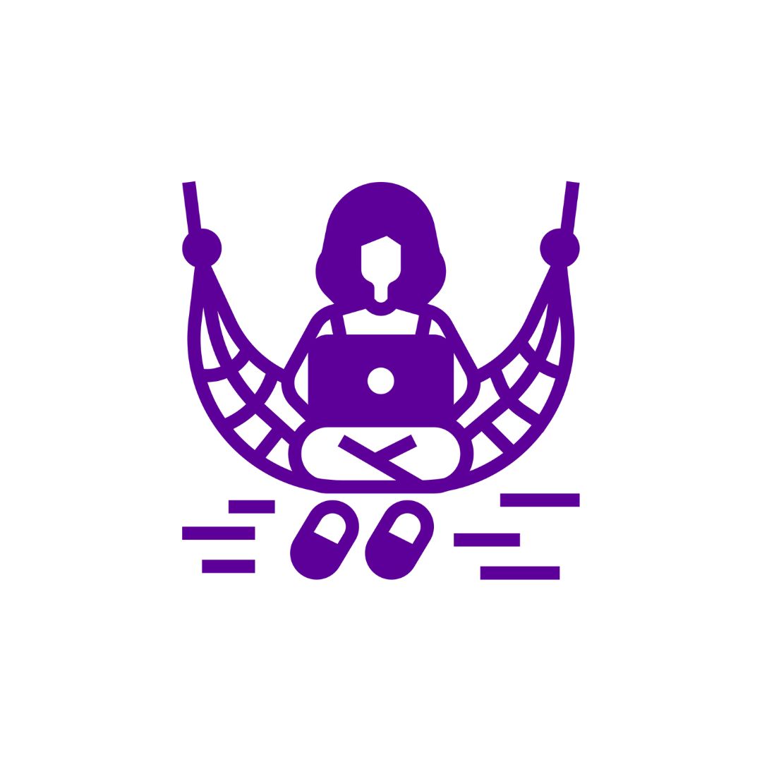 Person on laptop in a hammock