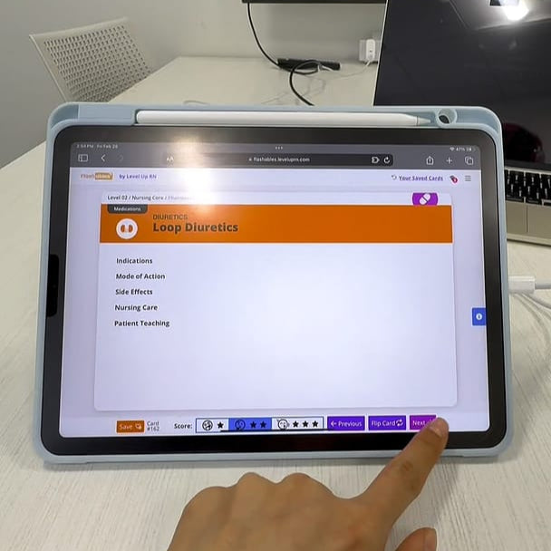 a hand clicking on digital flashcards
