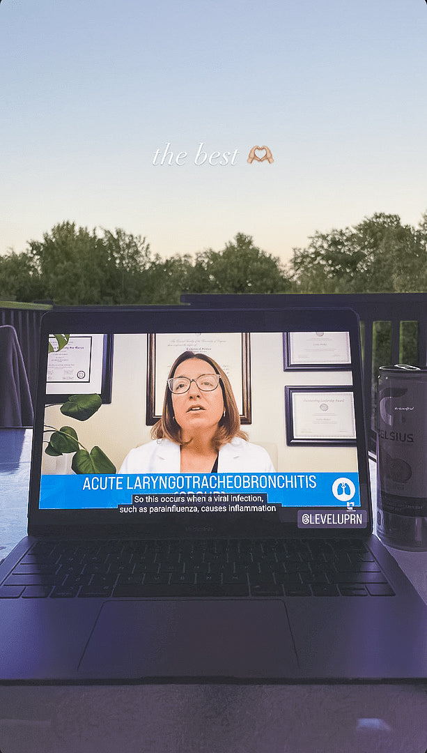 A laptop on a table outside with an afternoon landscape in the background and in the video, Cathy Parkes RN, BSN, PHN, CWCN is explaining Acute Laryngotracheobronchitis in the Pediatric Nursing playlist
